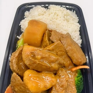 Curry chicken cooked in coconut milk lunch special